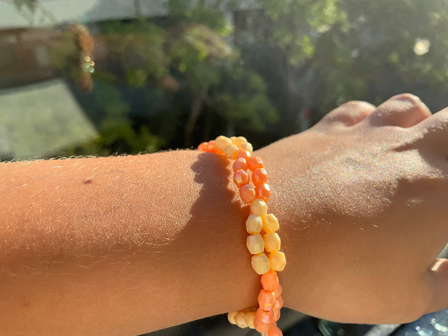 Beige champagne with beige and light orange bracelet